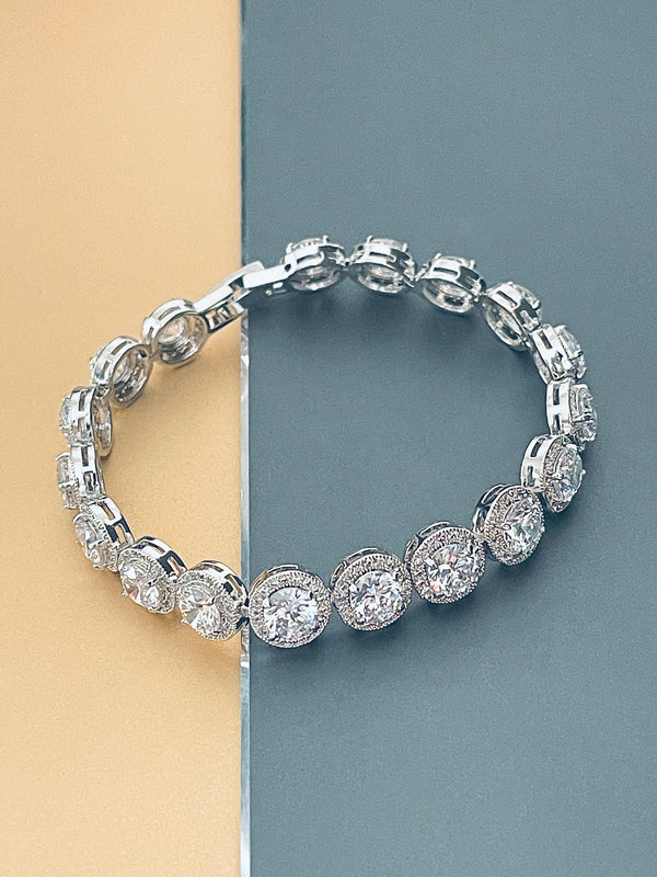 ONEIDA - 7" Larger Round CZ Stones In Small Round CZ Setting Bracelet In Silver - JohnnyB Jewelry